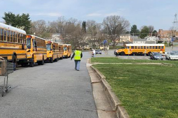 Buses lined up to deliver meals