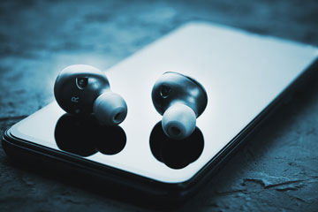 Earbuds on smartphone