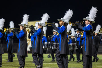 Marching band performing on field