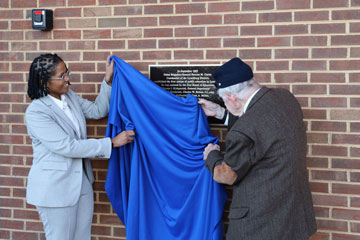 Dr. Midgette and Dr. Potter unveiling plaque
