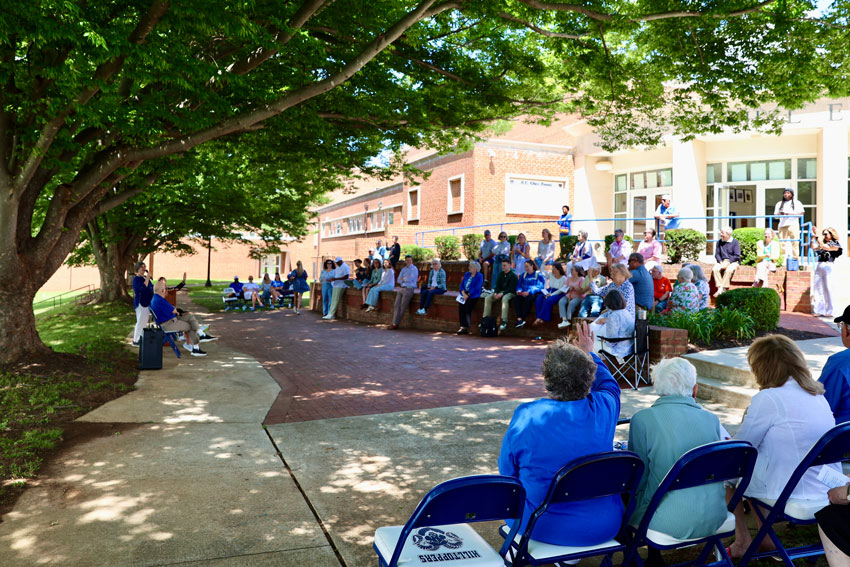 Group gathered outside for brick dedication ceremony