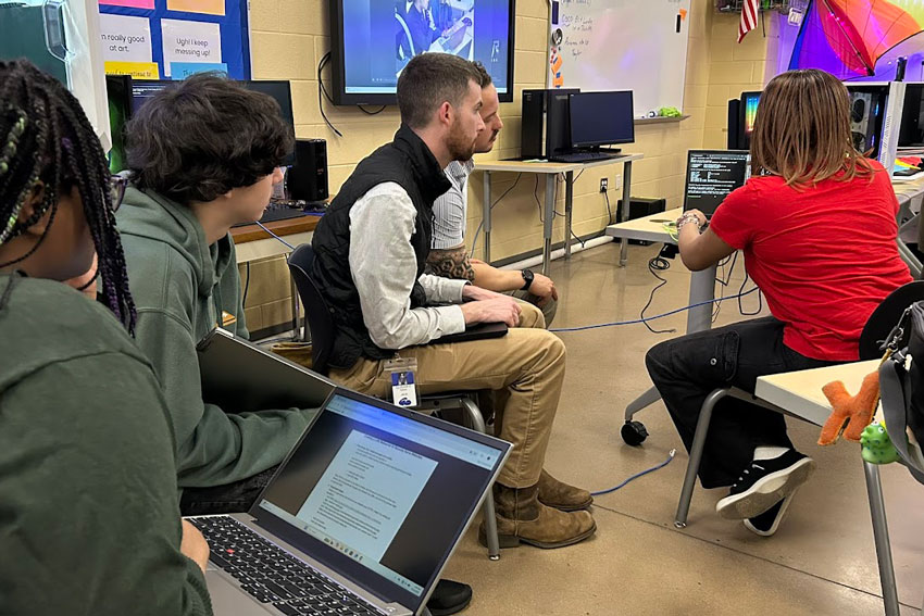 Cloudfit engineer working with students