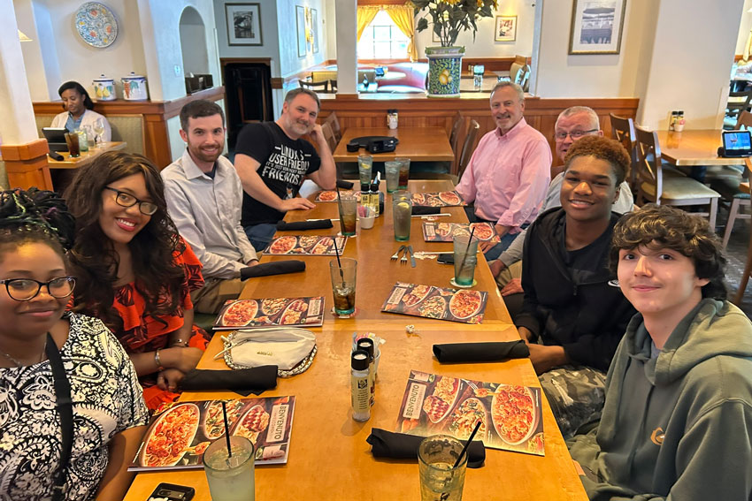 Students, staff and partners at dinner