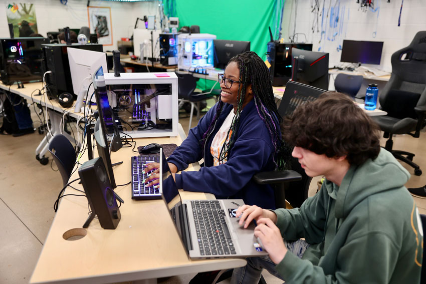 Two students working on computers