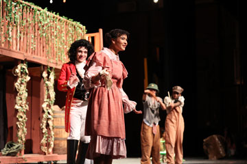High school students performing on stage
