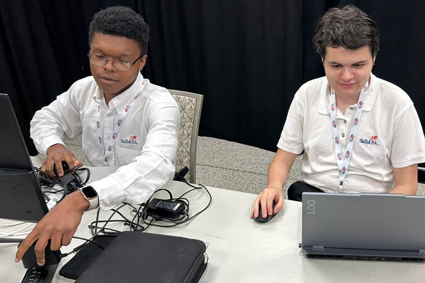 Joey Martin with classmate at SkillsUSA state competition