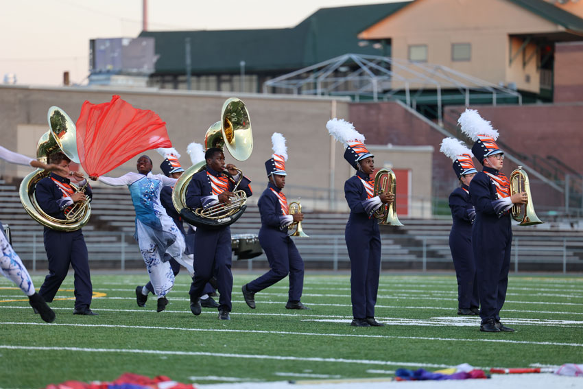Marching band performing on field