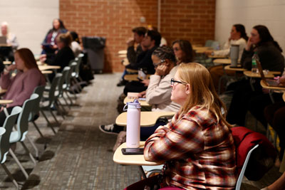 New teachers listening to presentation