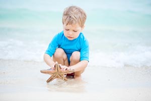 Little boy with starfish
