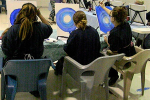 Students painting in class